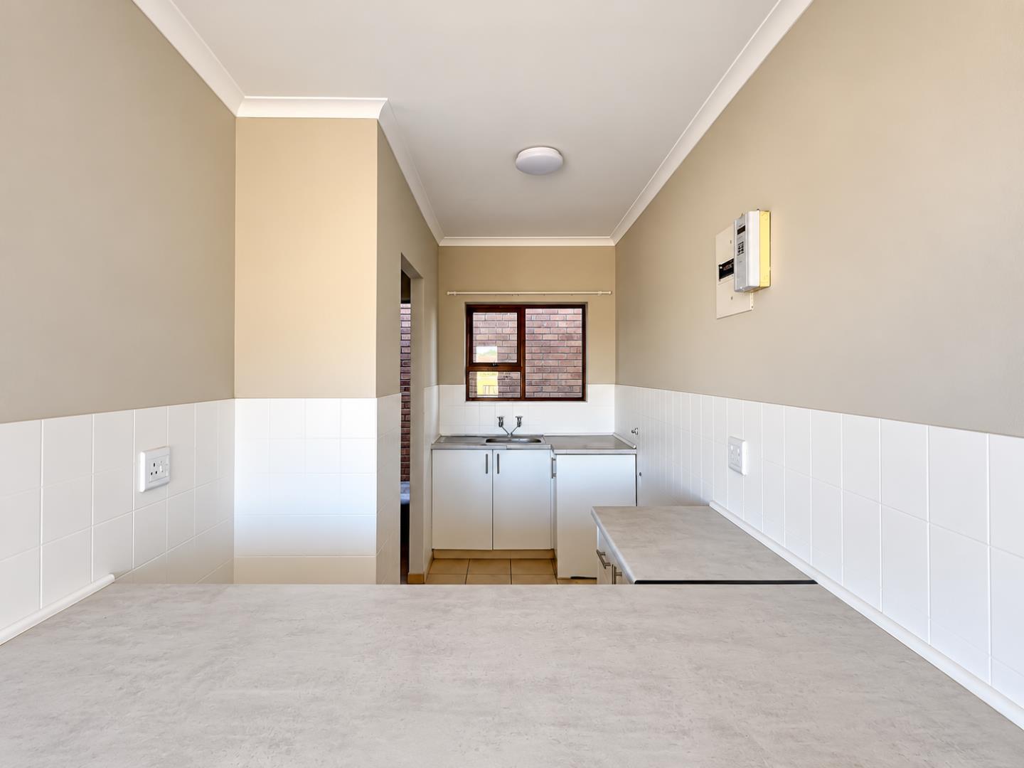 769655_Minimalist_Taupe_Galley_Kitchen.png
