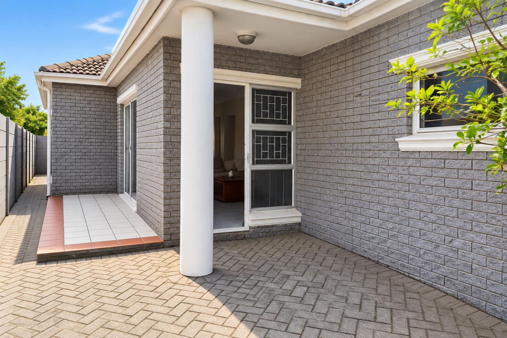 769695_Modern_Grey-Brick_Courtyard_Entrance.png