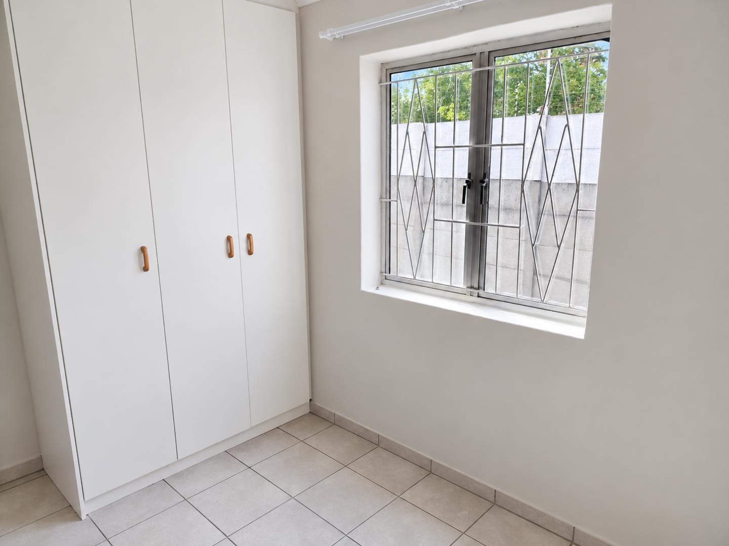 769788_Minimal_Wardrobe_and_Grilled_Window_Interior.png