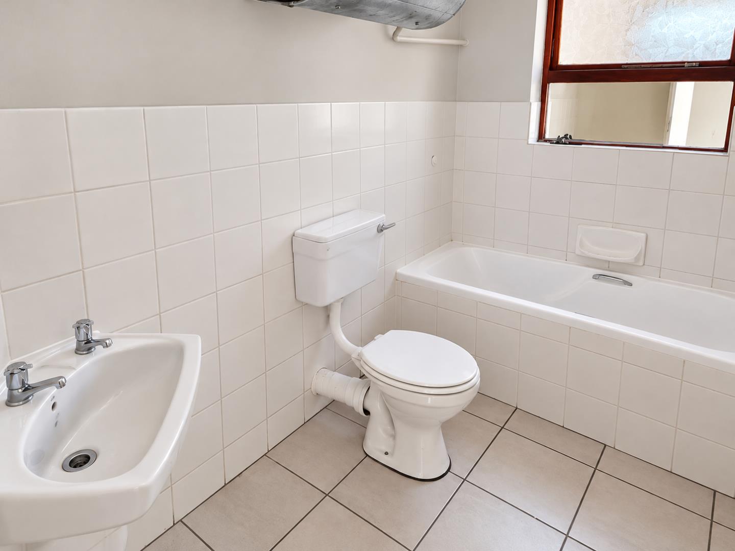 769803_Bright_Minimalist_Tiled_Bathroom.png