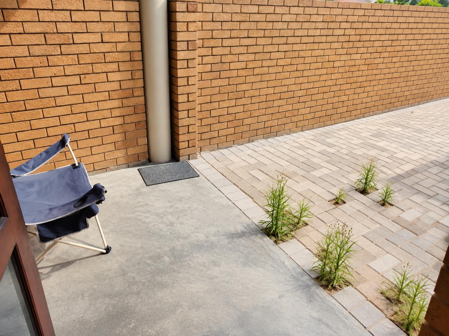 769803_Sunlit_Brick_Patio_Corner.png
