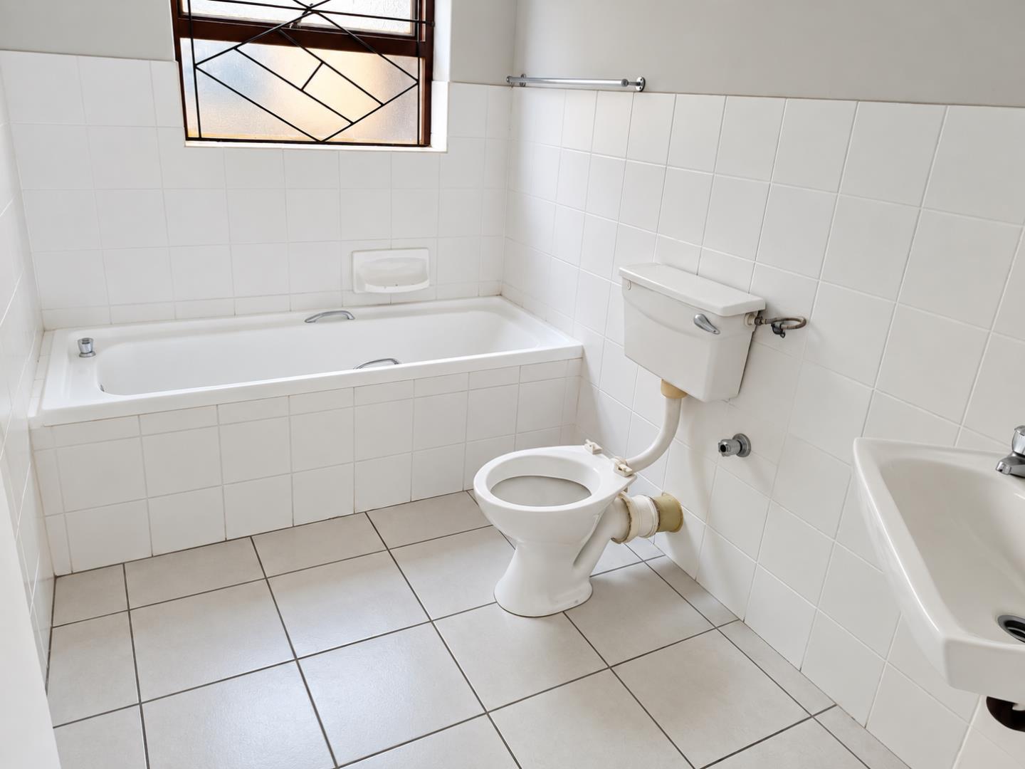769852_Bright_Minimalist_Tiled_Bathroom.png