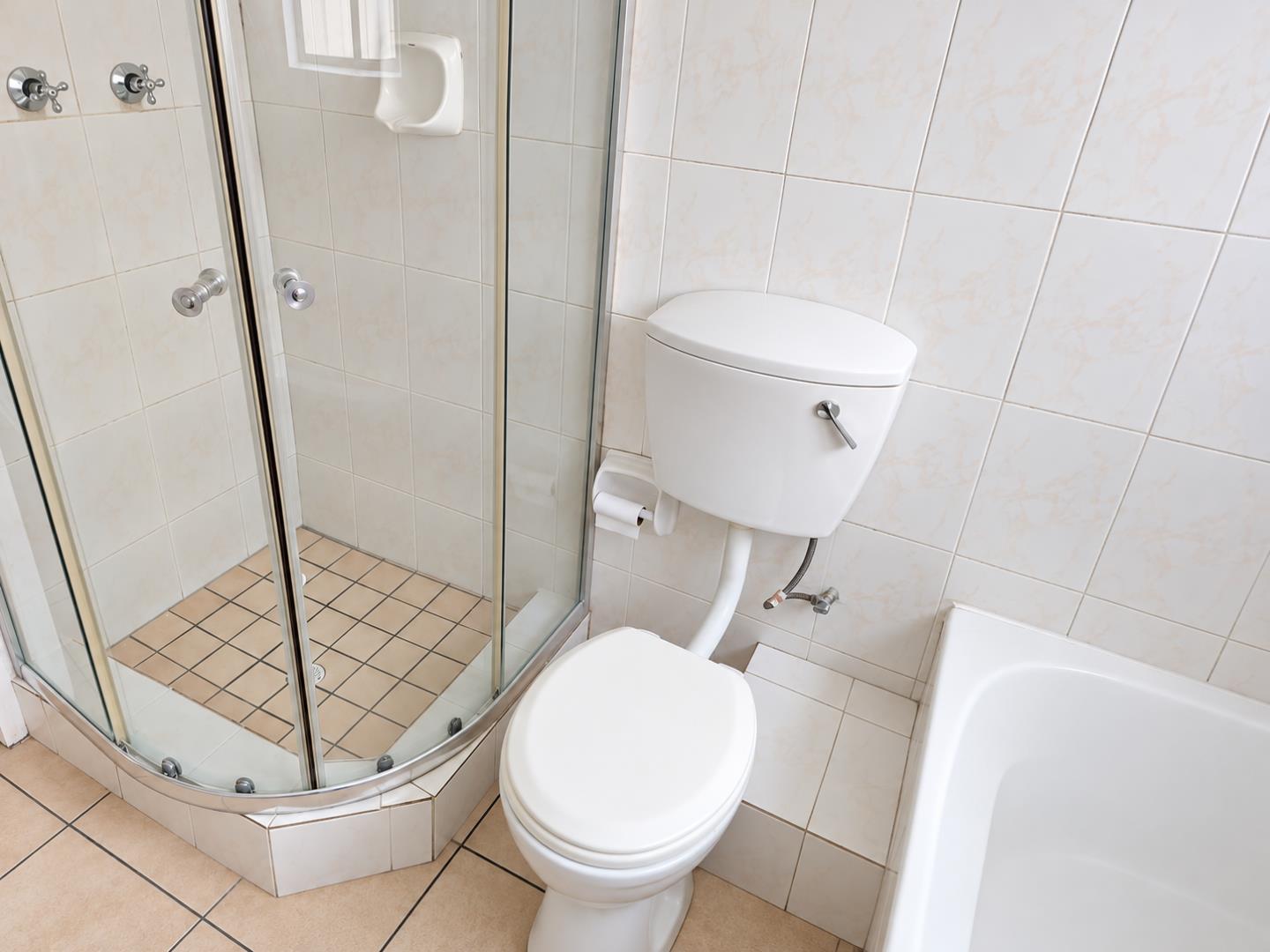 769856_Bright_Clean_Tiled_Bathroom_Corner.png