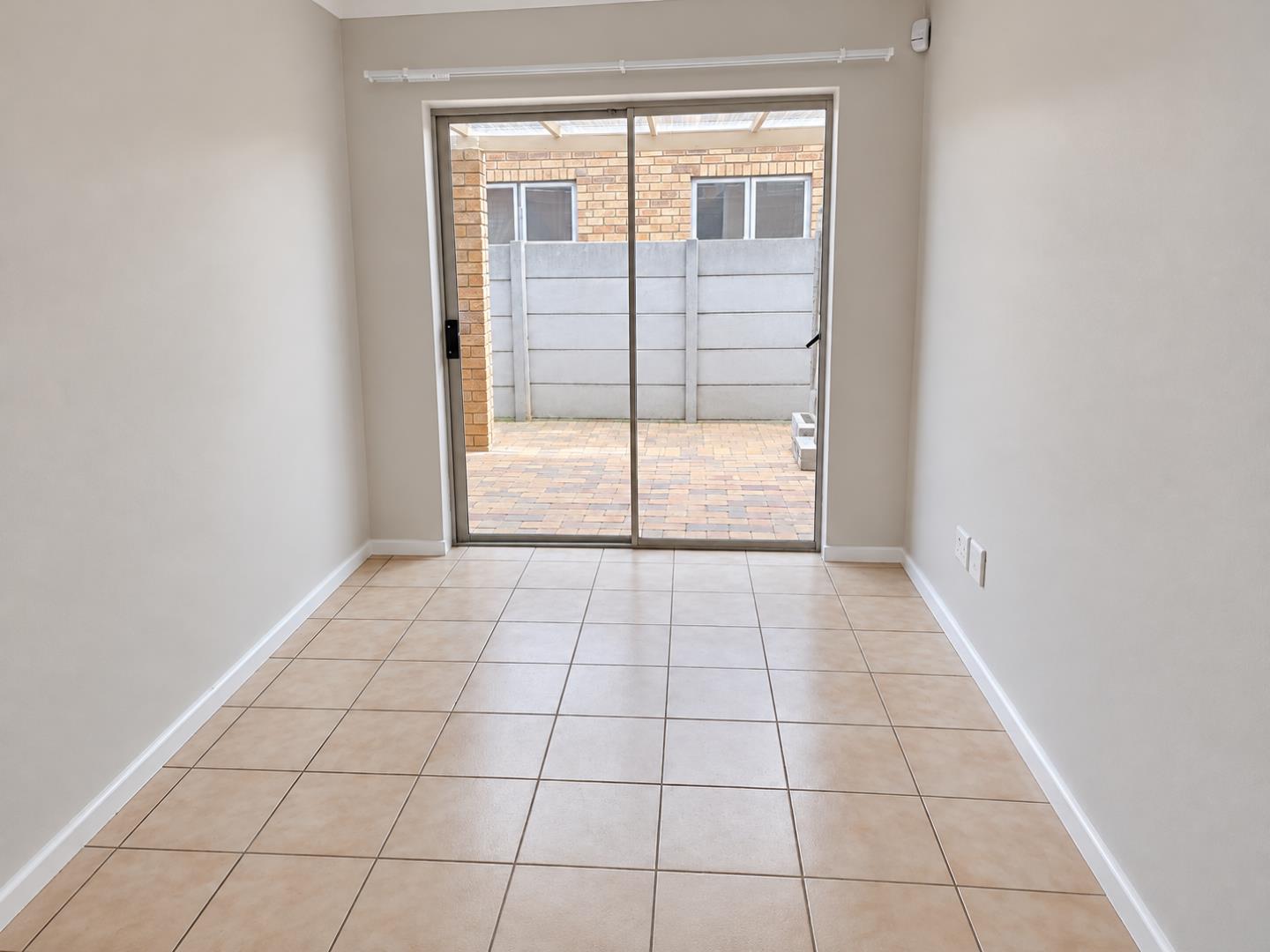 769856_Empty_Room_with_Patio_Views.png