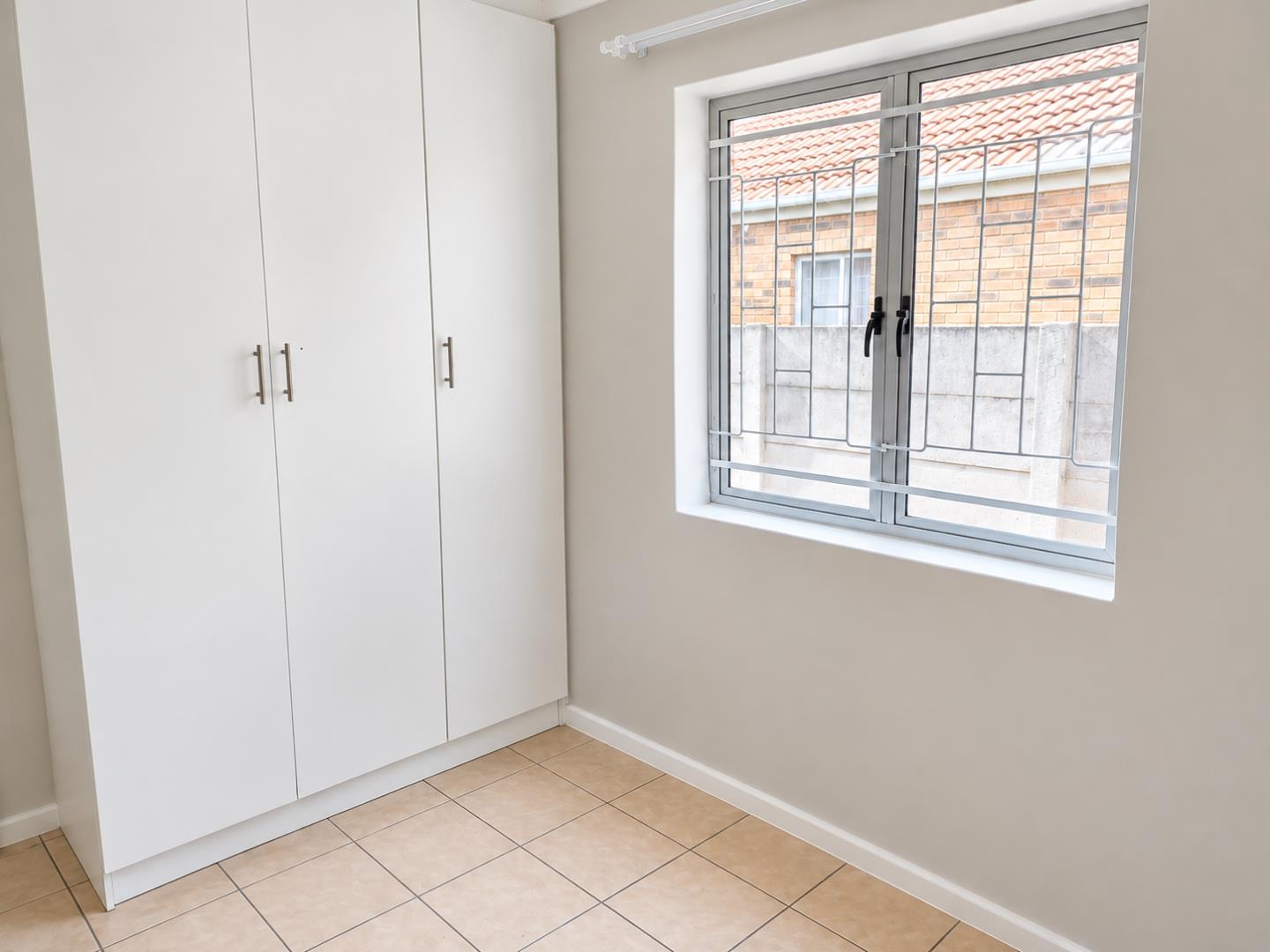 769856_Minimal_Room_with_Wardrobe_and_Window.png