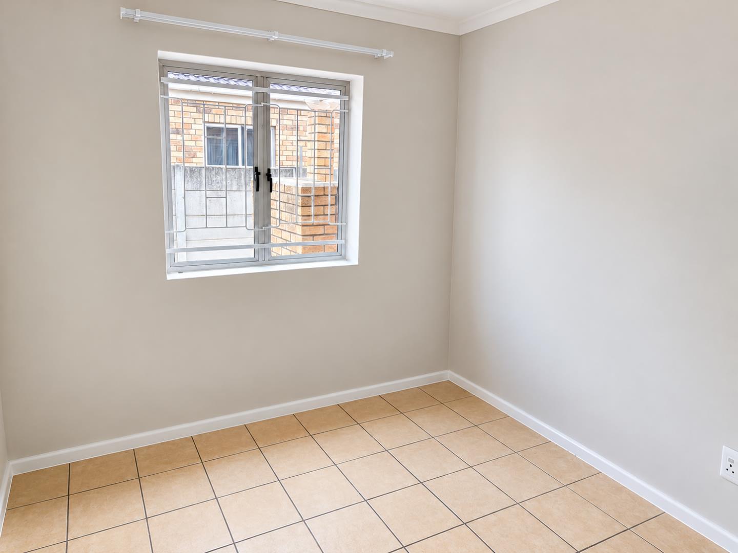 769856_Minimalist_Room_with_Grilled_Window.png
