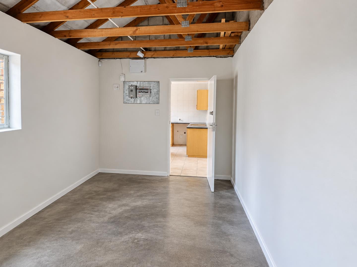 769856_Renovated_Utility_Room_with_Open_Kitchen_Door.png
