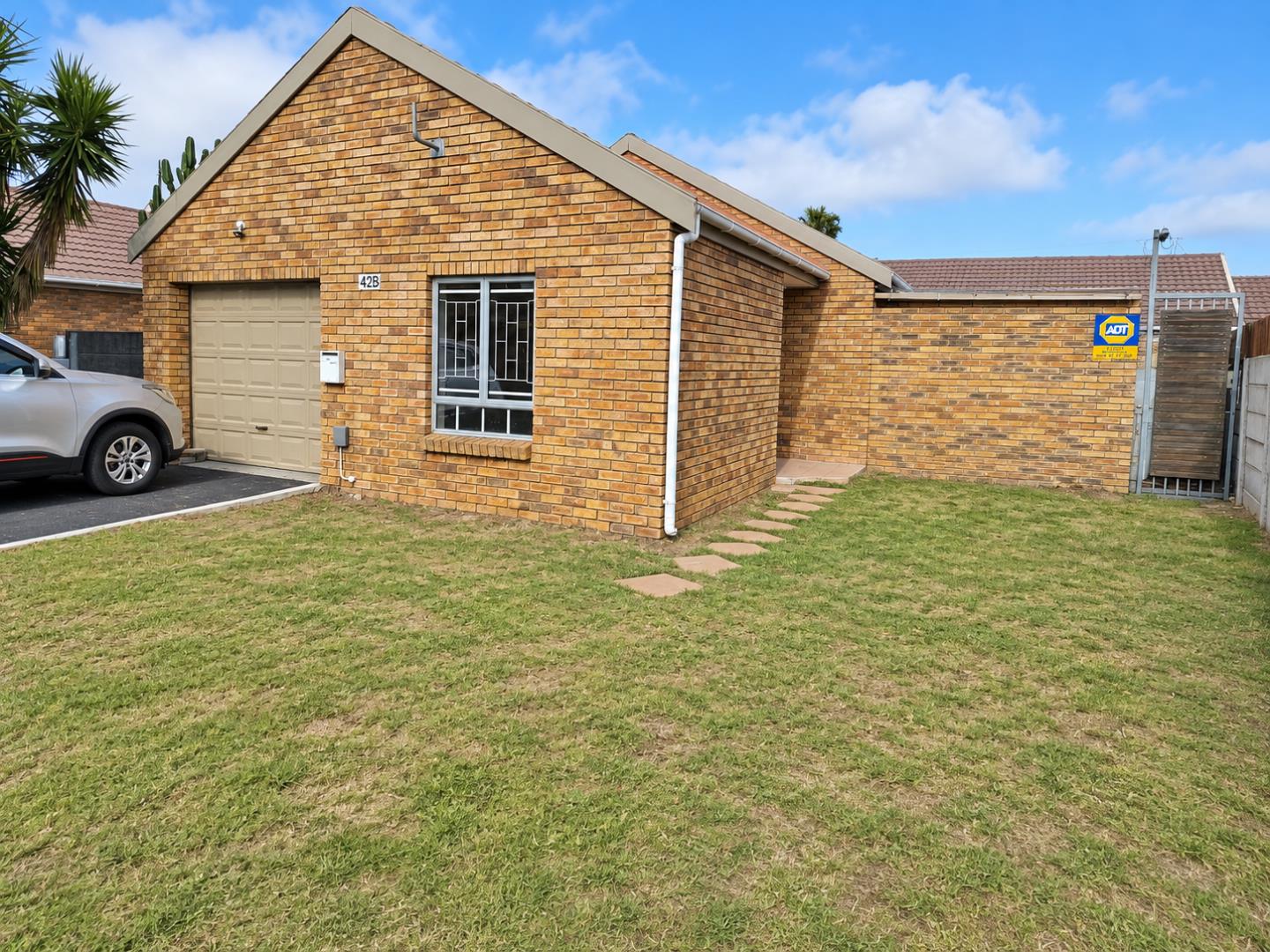 769856_Sunny_Suburban_Brick_Home_with_ADT_Security.png